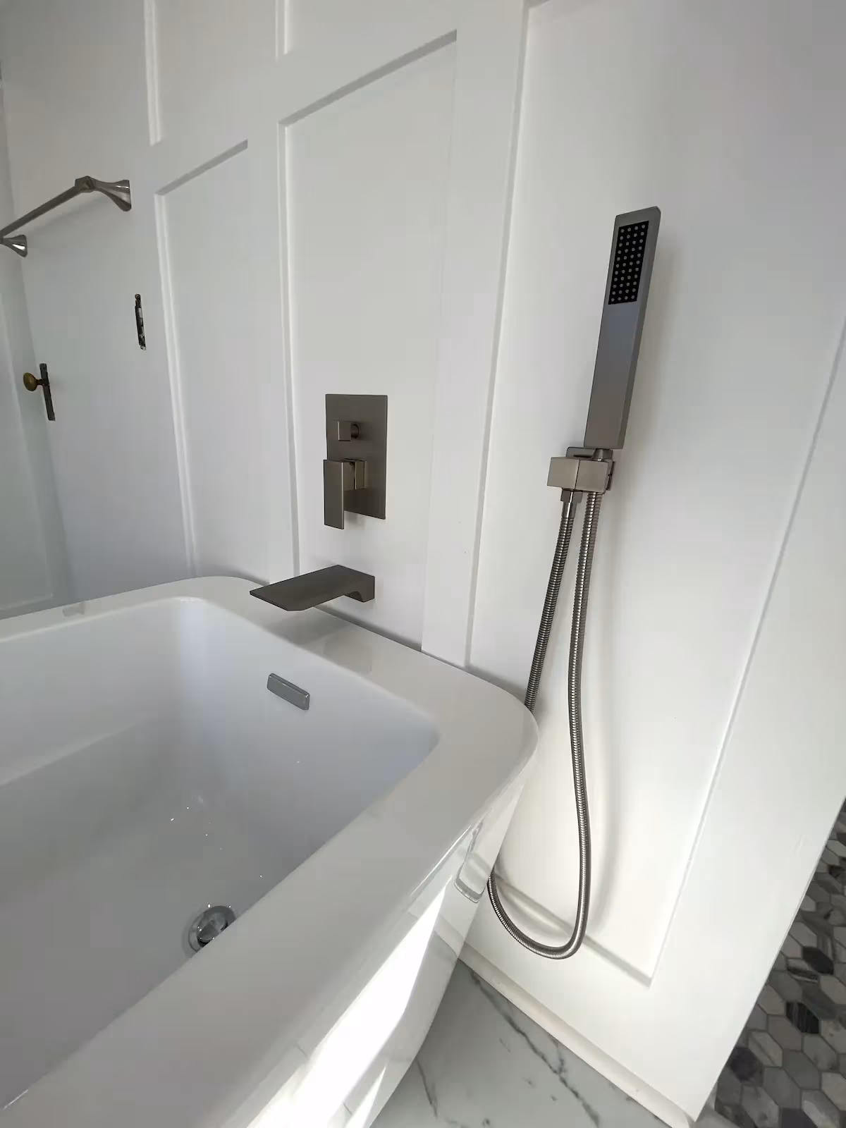 Freestanding tub bathroom remodel by Built Clough