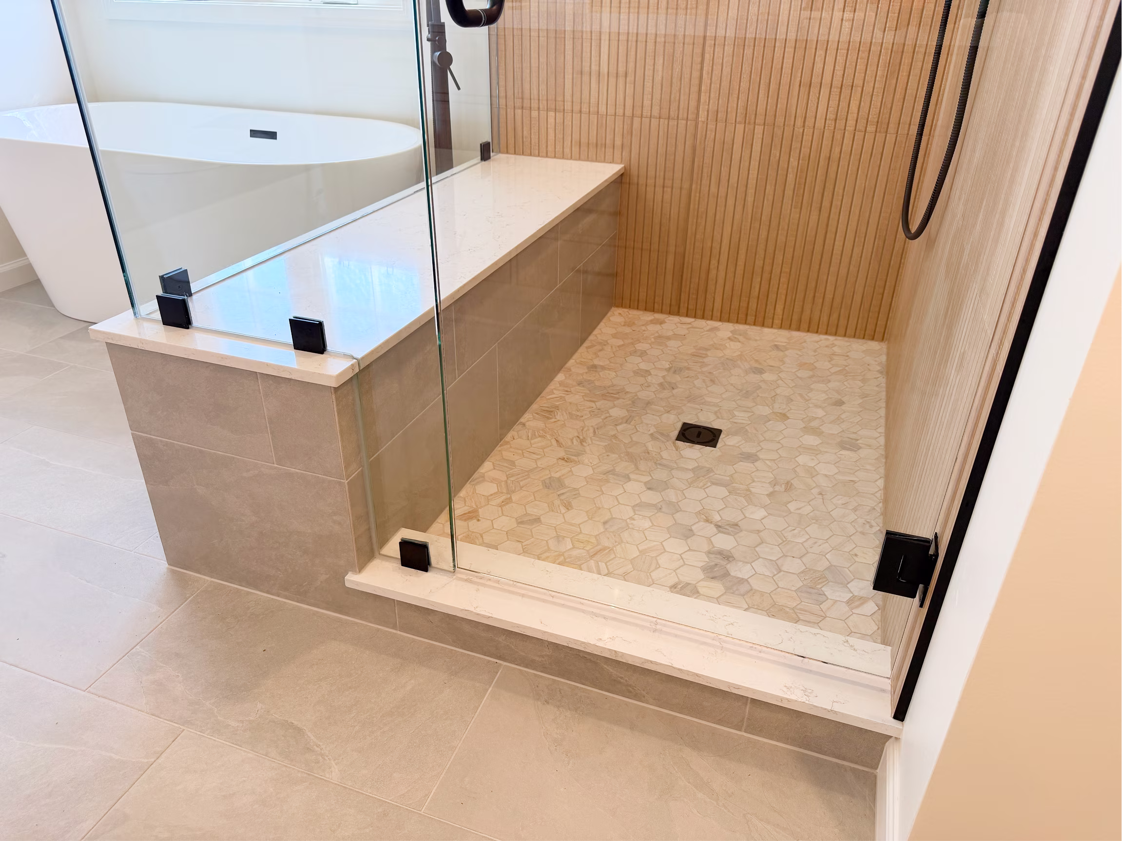 Apple Creek walk-in shower with bench by Built Clough